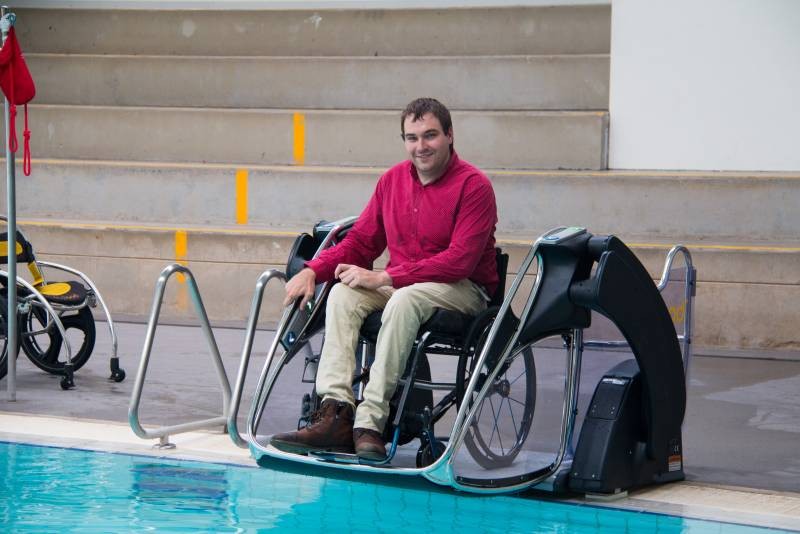 Council's Access and Inclusion Officer Mark Tomkins with the new Poolpod at Aquamoves.